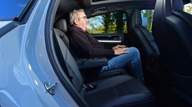 Porsche Cayenne vs BMW X5 - Porsche Cayenne rear seats with Auto Express senior test editor, Dean Gibson 